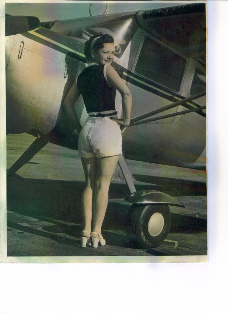 A Lady Photo Near To Aeroplane